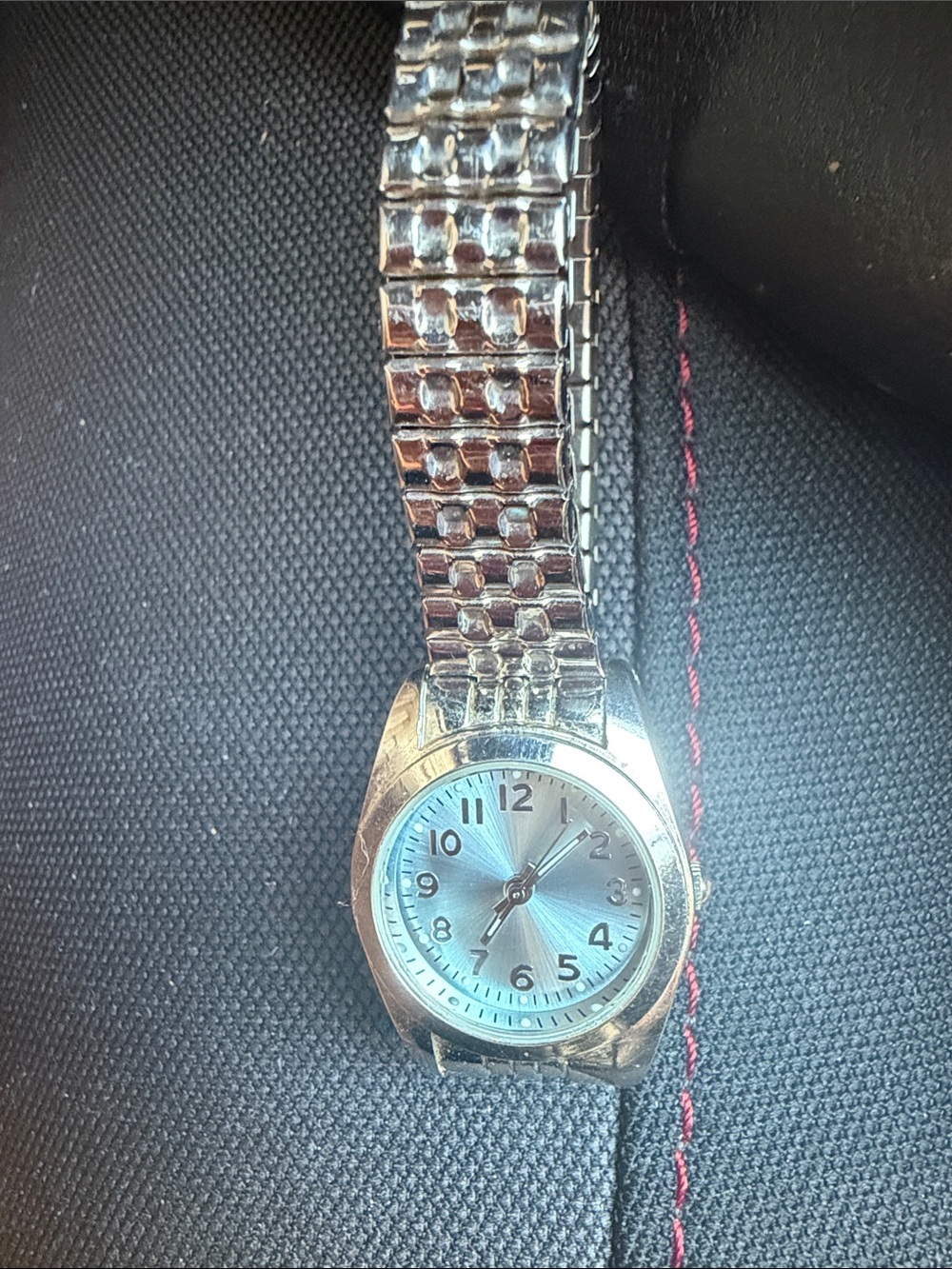 Source Unknown Silver Tone Women's Watch with Light Blue Dial needs battery
